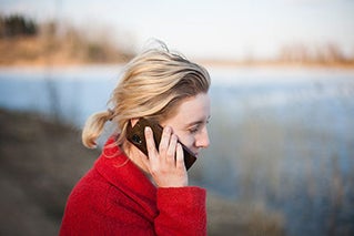 woman talking on mobile phone outdoors
