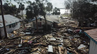 destroyed houses from hurricane and flooding