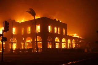 house burning from palisades california wildfires